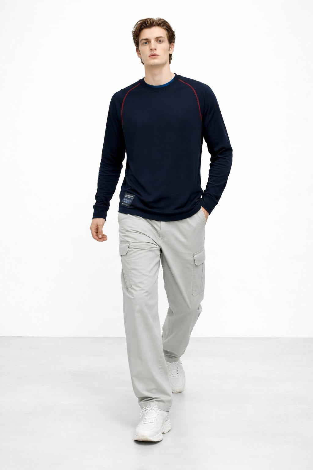 Model walking while wearing Long Sleeves Knit