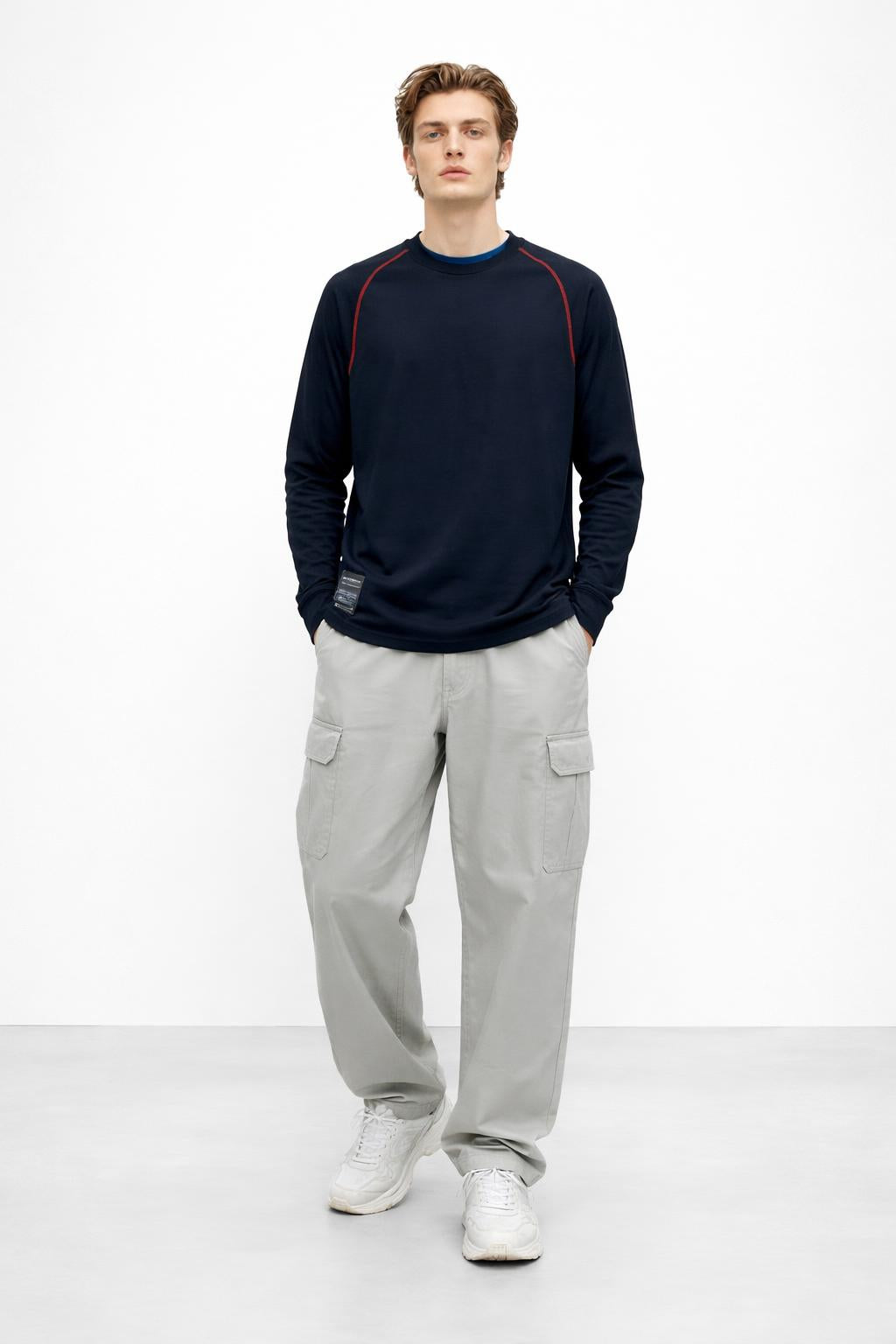 Full body view of the model wearing Long Sleeves Knit
